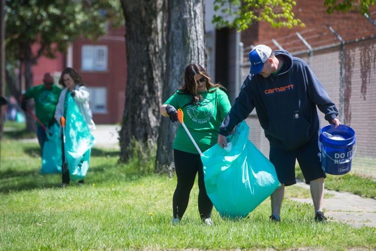 Volunteers clean up 7th Avenue for Earth Day | News | herald-dispatch.com