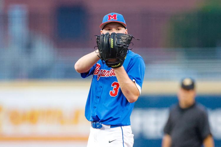 H Morgantown's Maddox Boggs waits for the pitch call.jpg