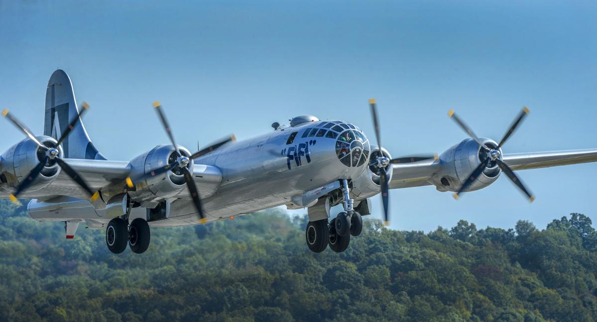 Rare B-29 Superfortress takes flight over the green ...