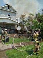 Crews respond to house fire in West End
