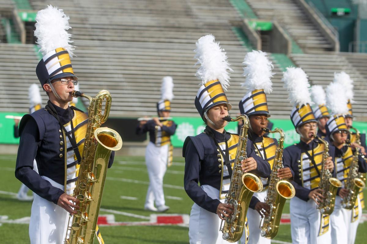 Area high school marching bands compete at Marshall News herald