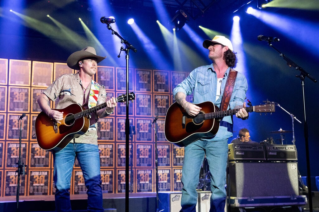 Brian Kelley and Tyler Hubbard on stage during their Florida Georgia Line reunion era