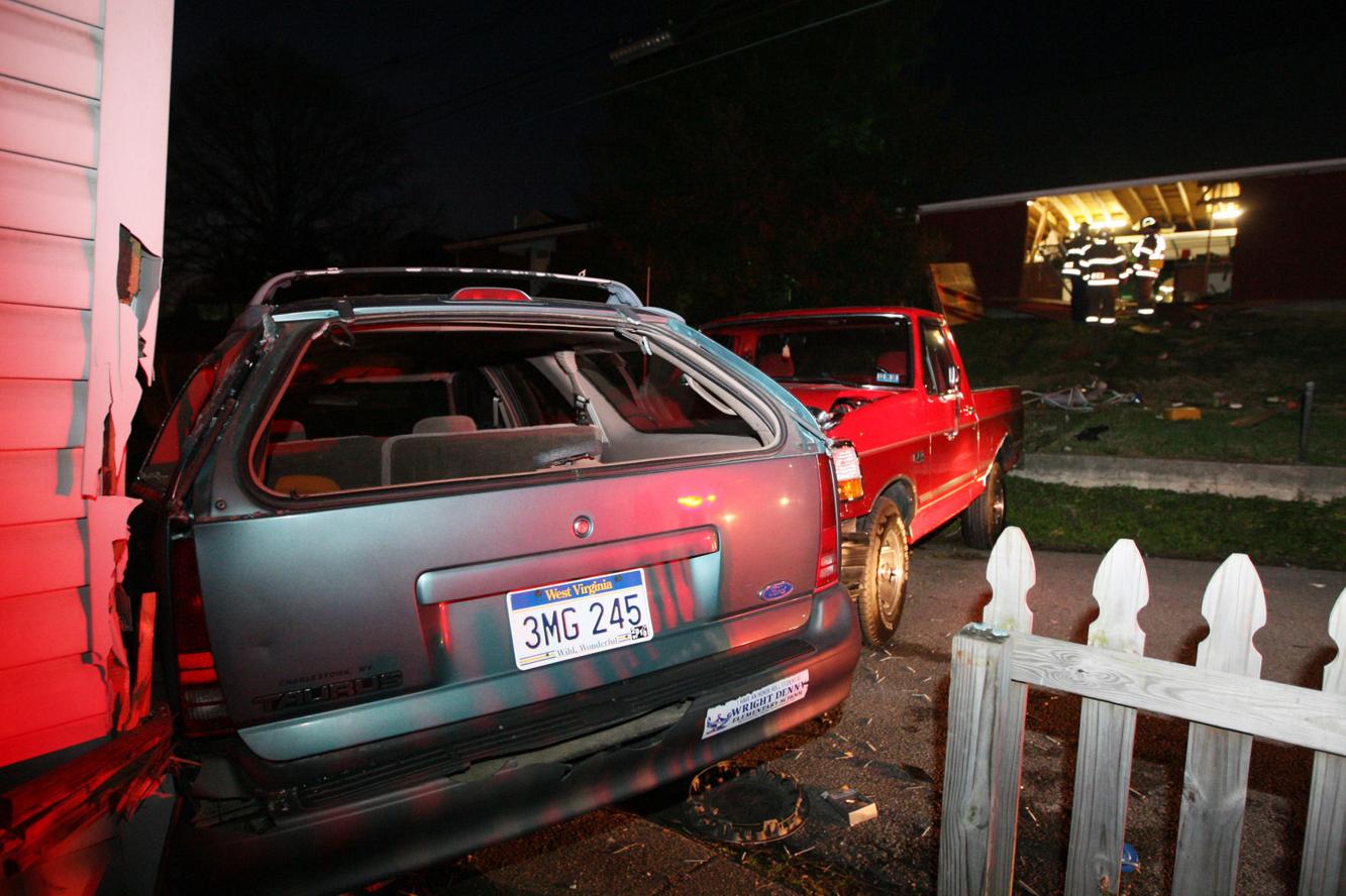 Woman drives truck through garage, into neighbor's vehicle News