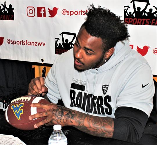 WVU football stars sign autographs at Sports Fanz Putnam News