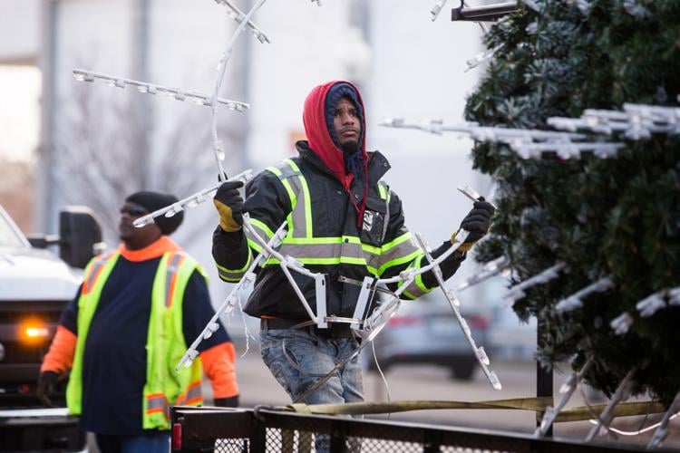 City workers take down Christmas decorations News