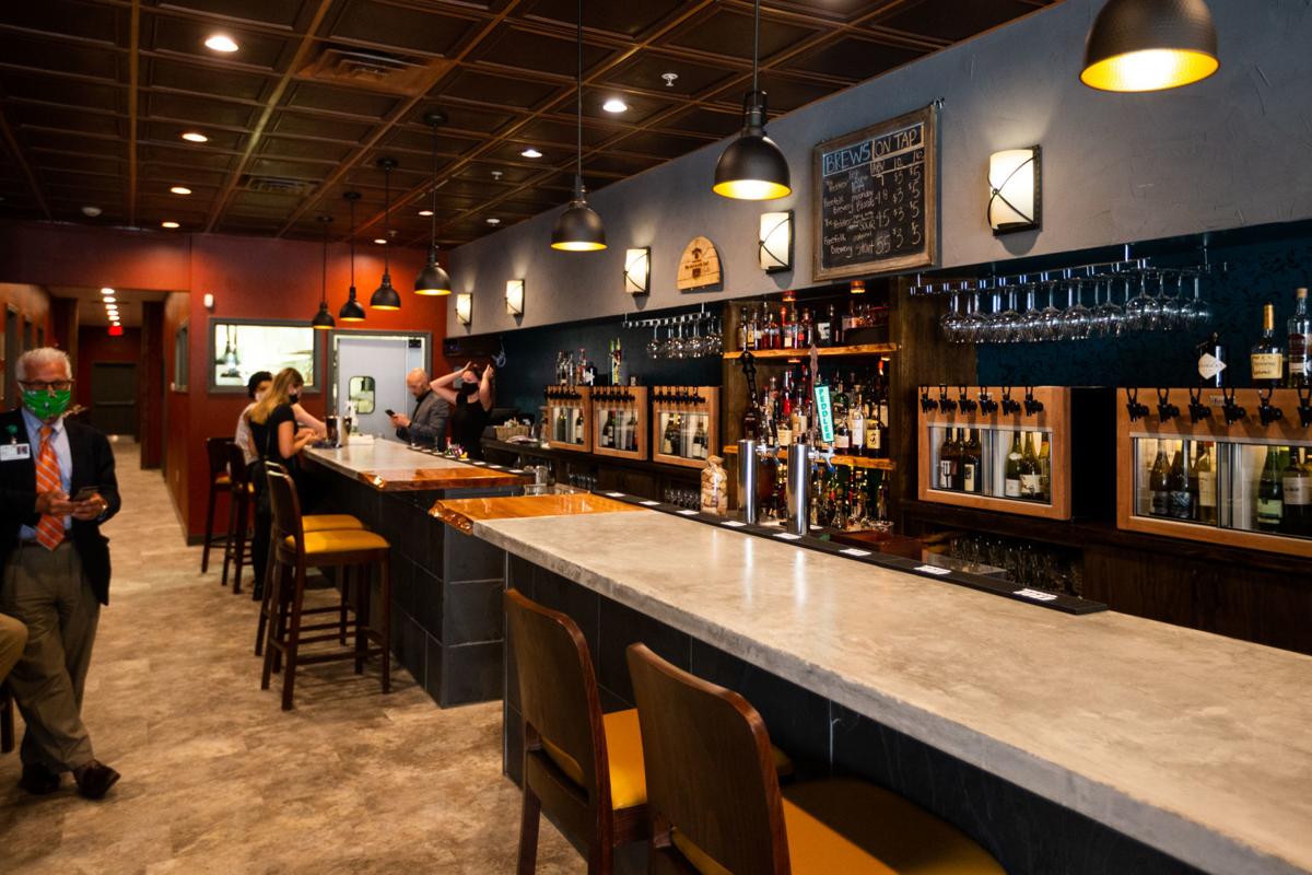 Sip wine, whiskey bar moves to larger location in downtown Huntington