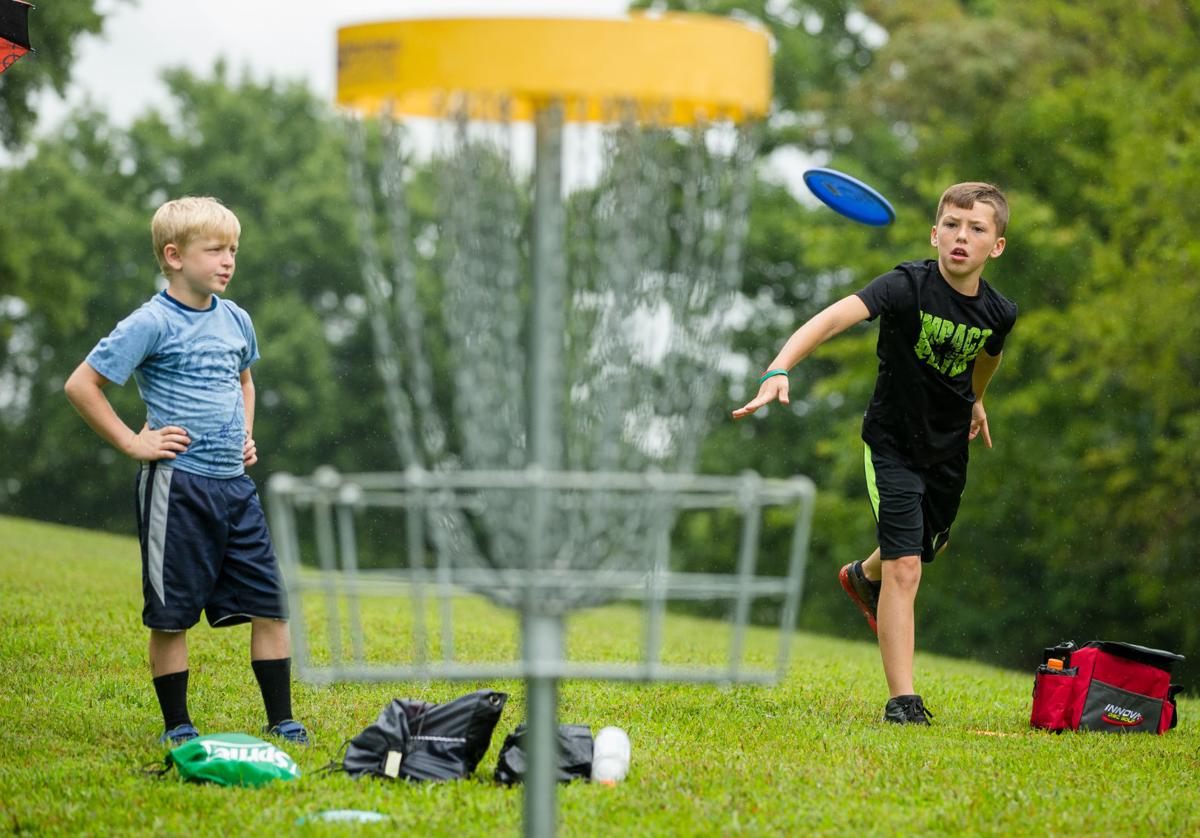 Kids learn art of disc golf Features/Entertainment
