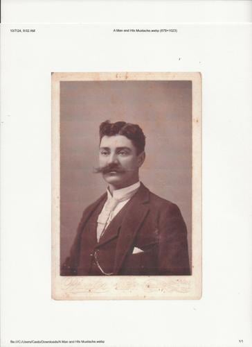 A Man and His Mustache.jpeg