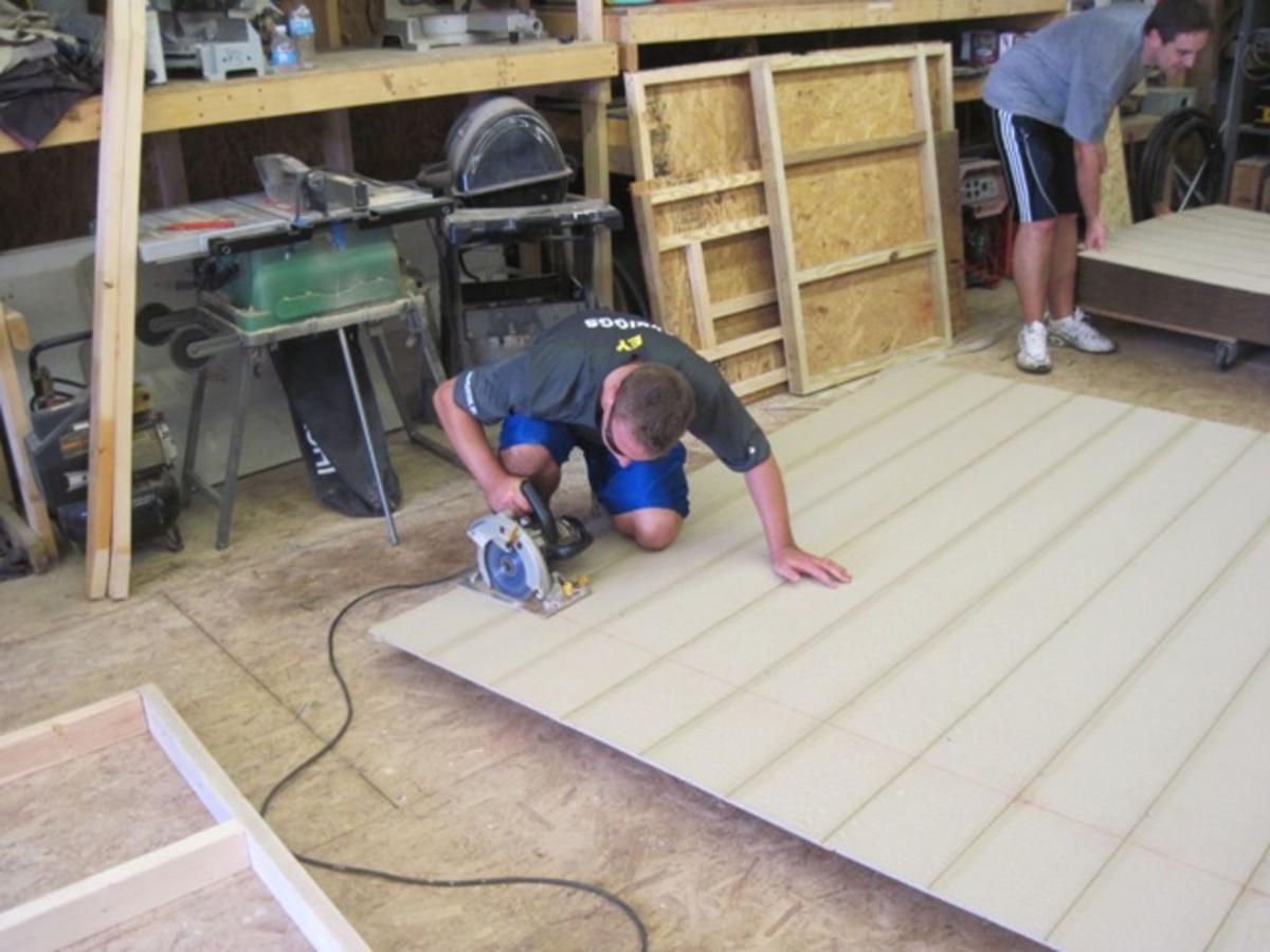 Gallery EY of Charleston volunteers help at Habitat News herald