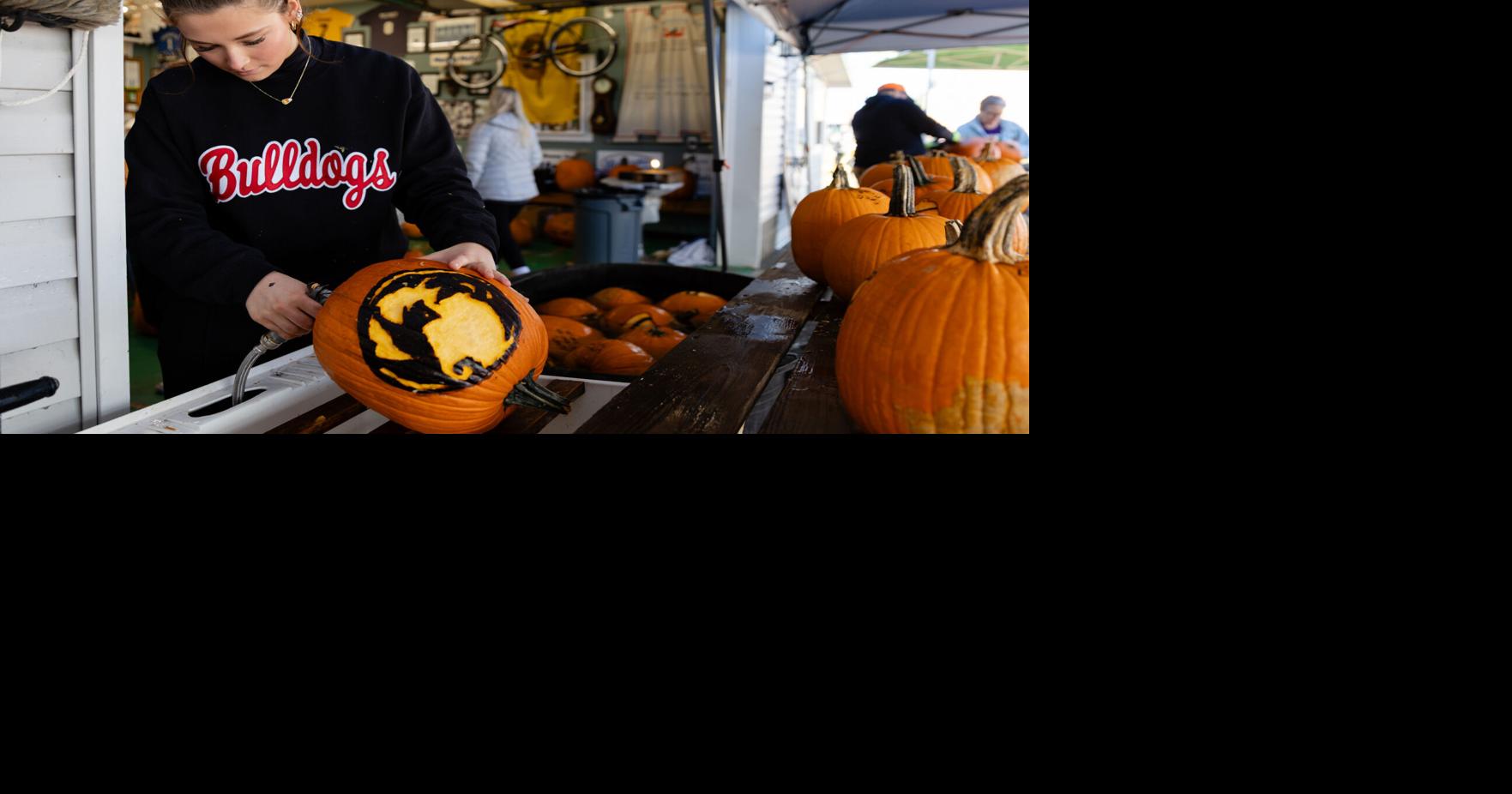 Photos: Volunteers carve pumpkins for Kenova Pumpkin House display