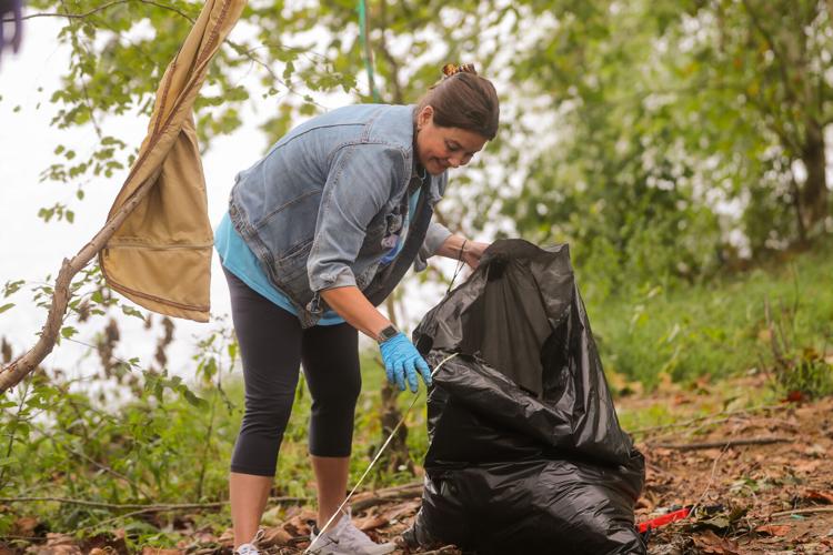 Photos: Volunteers clean up McClelland Park riverfront area ...
