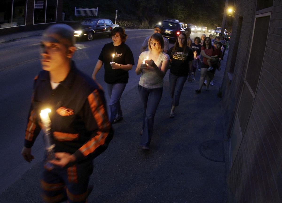 Candlelight vigil honors those lost, missing in blast