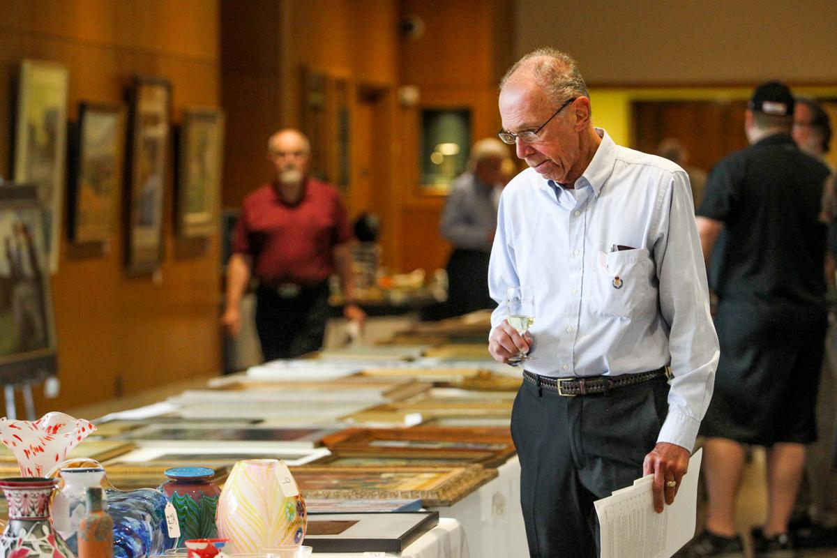 Photos 4th Annual Fine Art Auction at HMA Photo Galleries herald