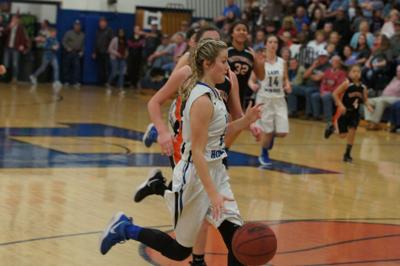 Huntland Basketball Teams Split Homecoming Doubleheader Versus