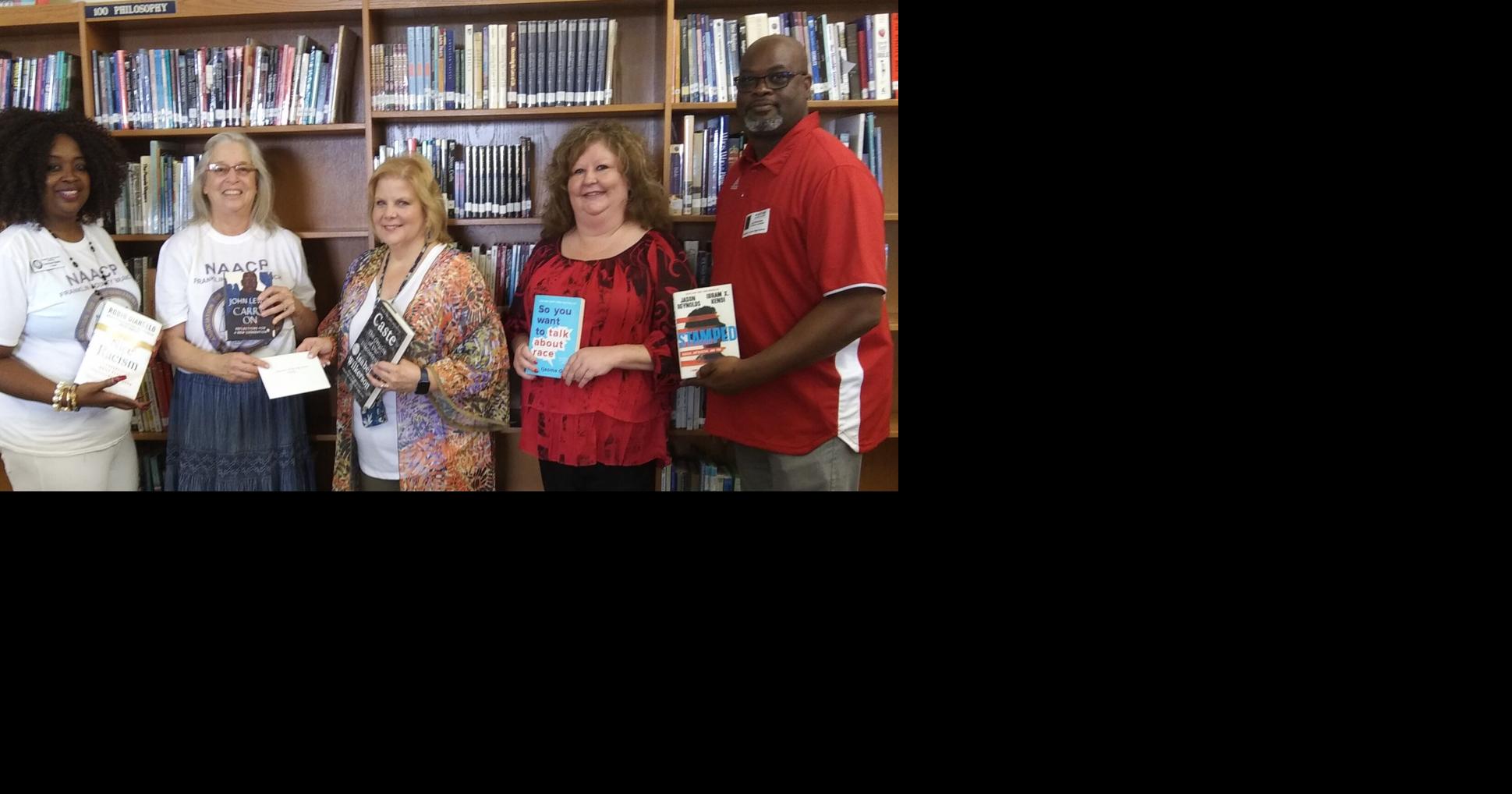 NAACP Education Committee donates books to FCHS library