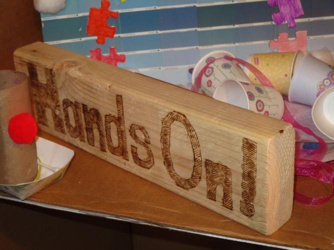 One visitor fashioned a “Hands On!" sign.