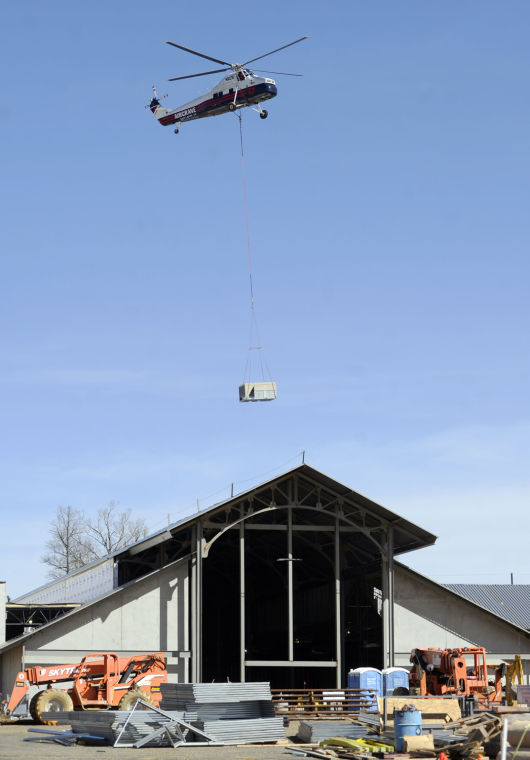 Helicopter brought in to install HVAC units on Bass Pro Shops roof