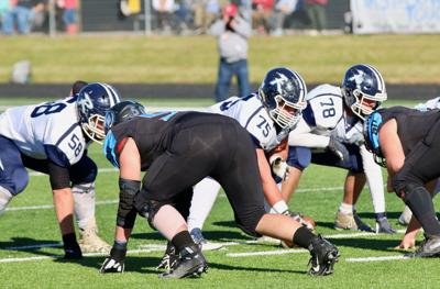 Moore Directs The Richlands Offensive Line At Center Sports
