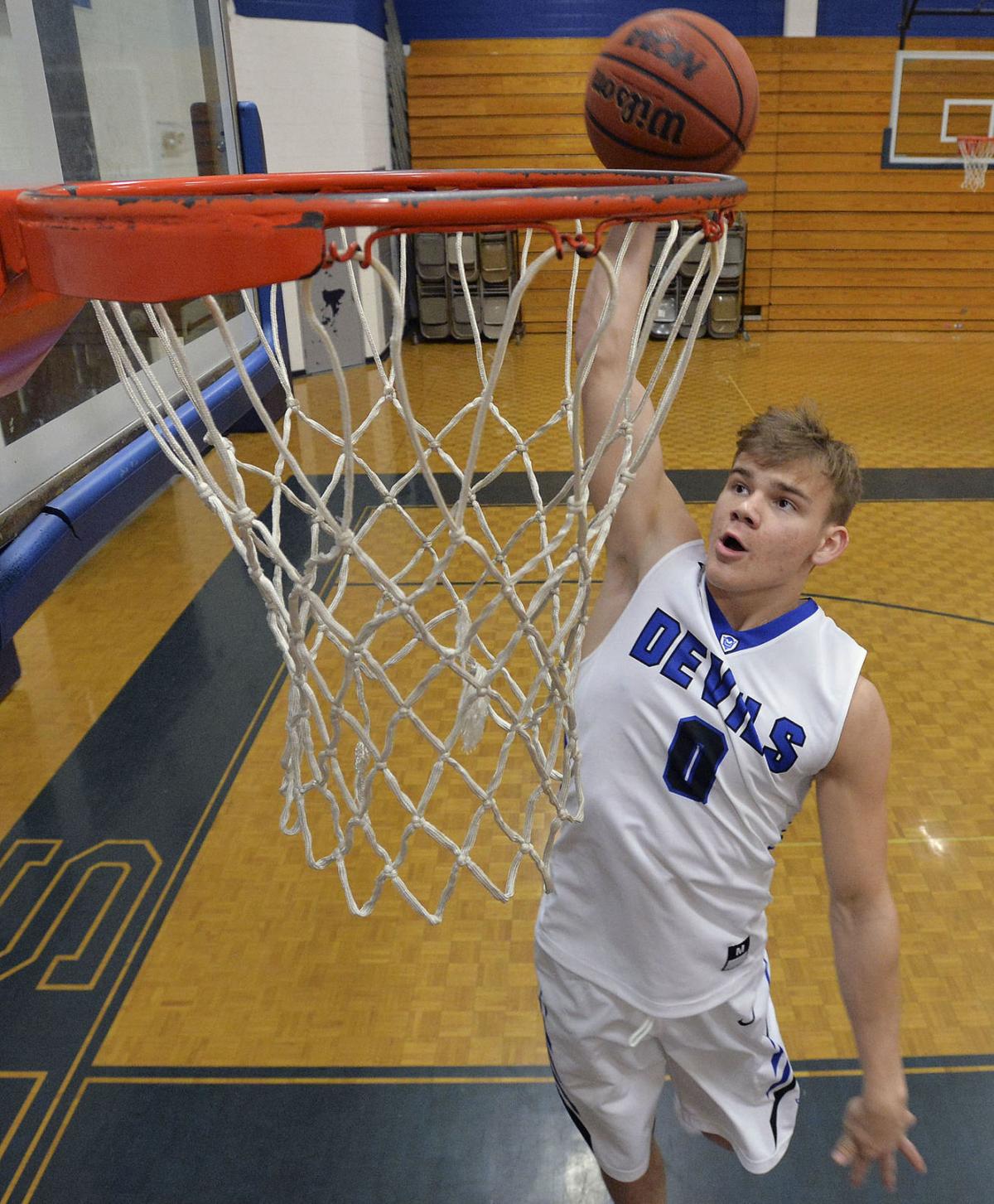McClung wins slam dunk contest and scores 20 in allstar game