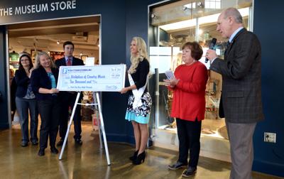 food city birthplace museum music race night family heraldcourier ceo presents steve president smith county check