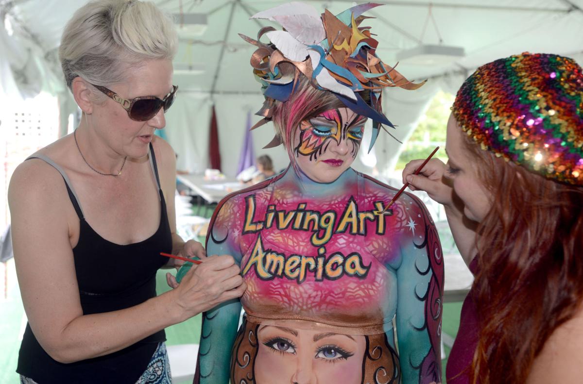 Artists Paint Model For First Body Art Display At Local Virginia