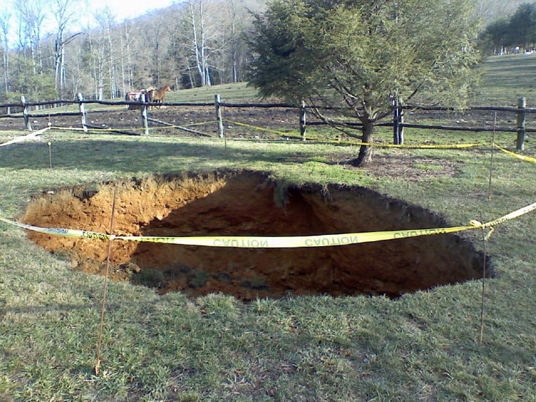 Homeowner Discovers Massive Sinkhole In Yard