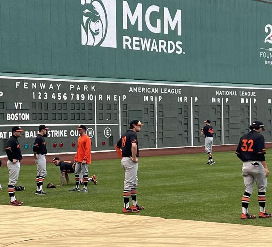 Reds players go inside the Green Monster at Fenway Park 