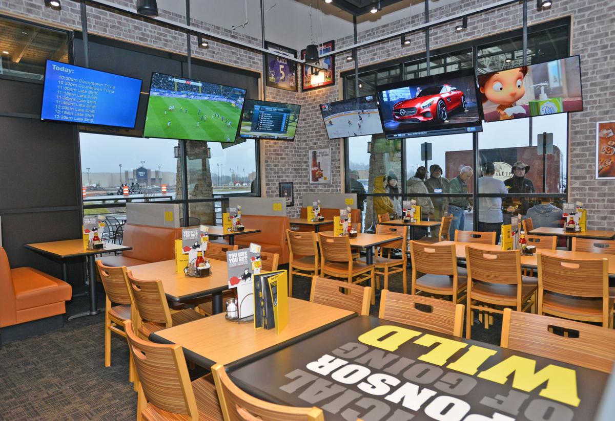 Hundreds waited outside of Buffalo Wild Wings for a special grand