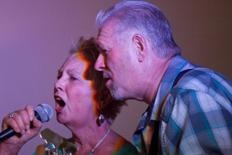 Rosa Jane Mullins, 68, of Kingsport, sings Patsy Cline’s “I Fall to Pieces” with Frank Perry of Shooter.
