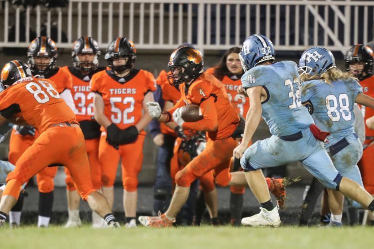 PREP FOOTBALL Honaker unleashes rushing attack in improving to 80