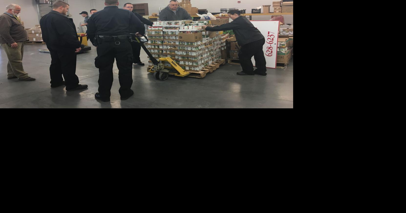Southwest Va. Regional Jail officers donate 8,000 cans to food pantry