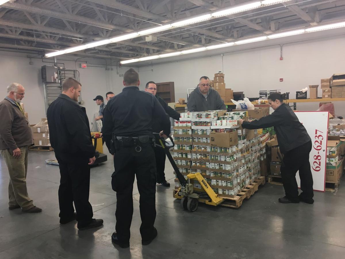 Southwest Va. Regional Jail officers donate 8,000 cans to food pantry