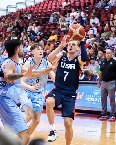 Mac McClung scores eight points in college debut