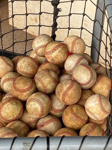 Basket of baseballs