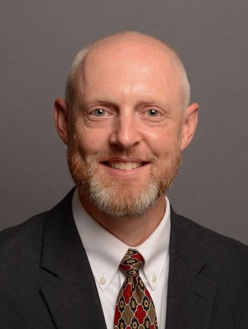 Adam C. Hutchison