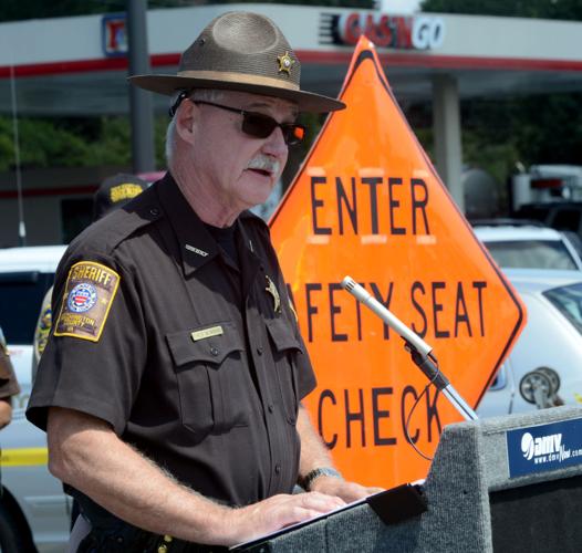 Child seat ID sticker to aid in rescue