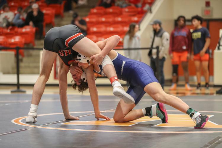 PREP WRESTLING: Graham wins SWD title in dramatic fashion