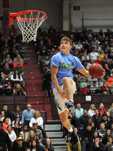 Watch: Mac McClung brings out his high school jersey on phenomenal