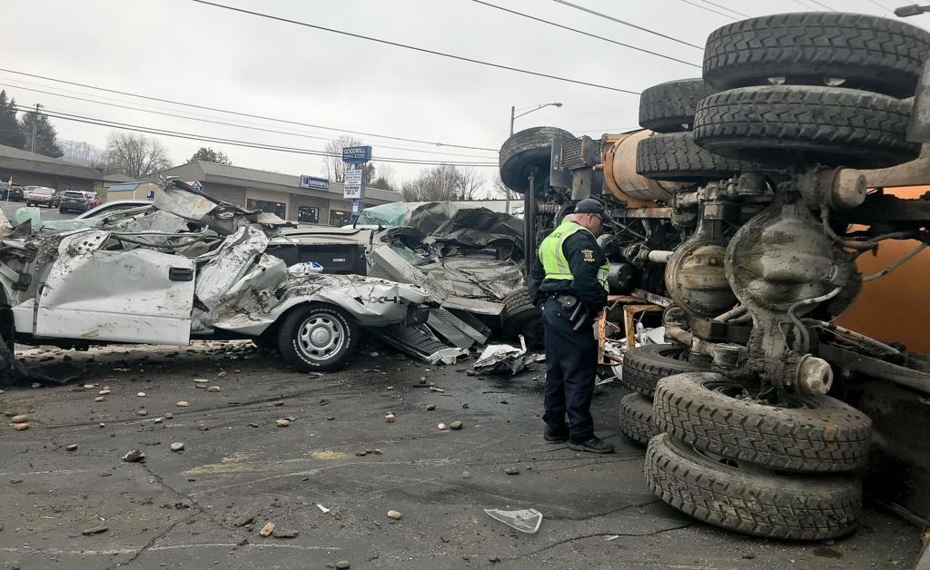 Concrete Truck Driver Loses Control Crashes Into Car Lot