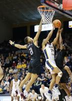 Solid defense and balanced attack leads Racers past Bears