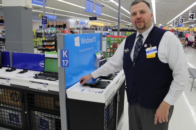 Walmart staff welcomes customers to remodeled Richardson location