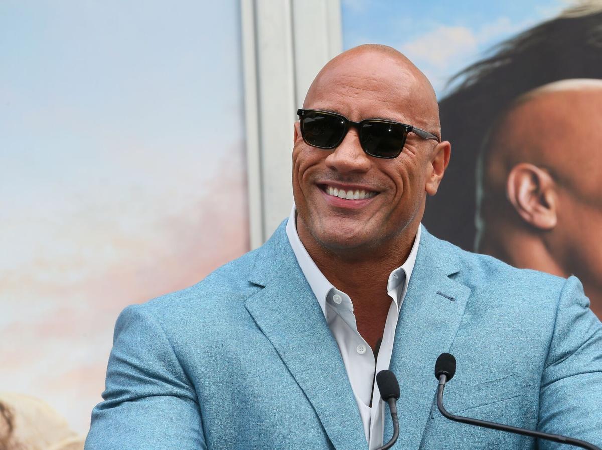 Dwayne Johnson attends a Hand and Footprint ceremony honoring Kevin Hart at the TCL Chinese Theatre IMAX on December 10, 2019 in Hollywood, Ca.