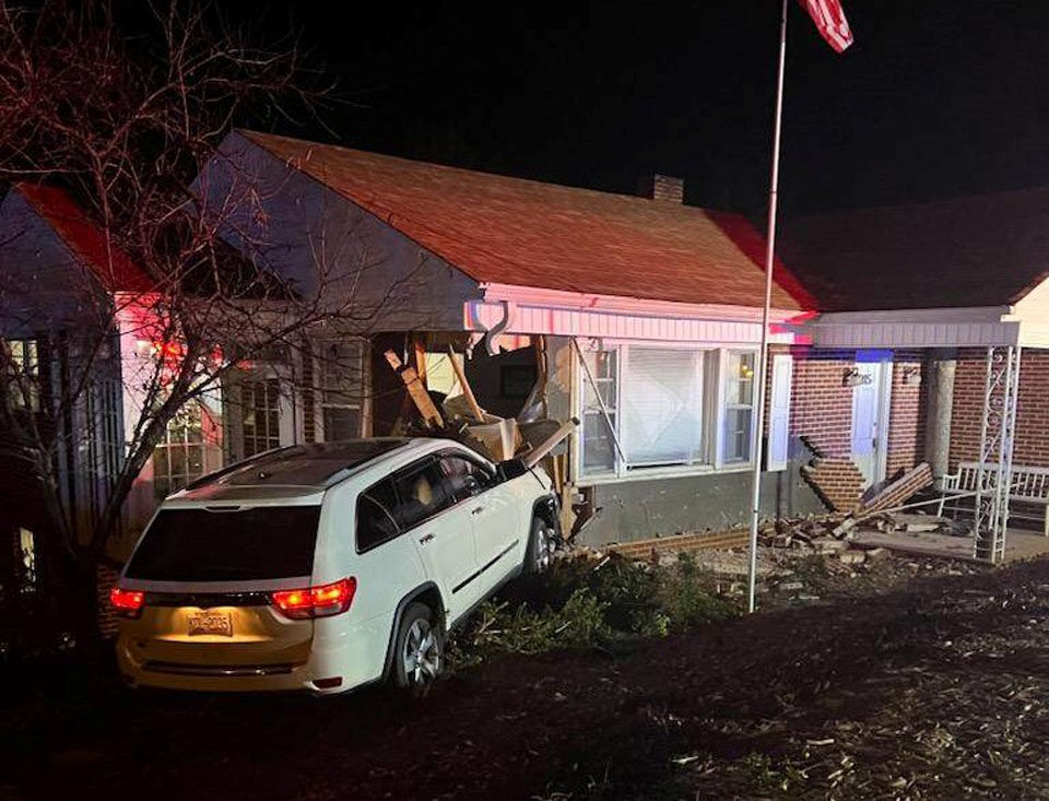 Driver who crashed car into home on Thanksgiving Day cited by police