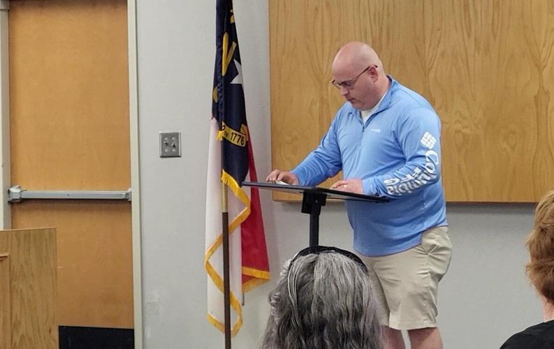 Prayer, politics, books at Catawba County Schools meeting