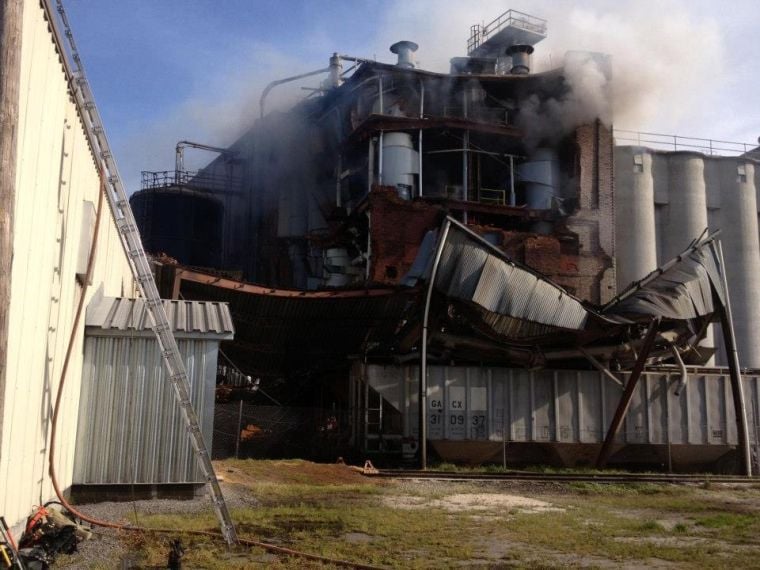 Explosion sparks blaze at flour mill; one injured