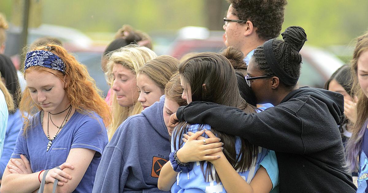 Eighthgrader's smile, humor remembered at vigil, balloon launch
