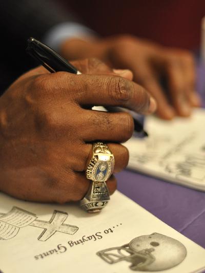 Super Bowl winning football player now encourages youth to put others ...