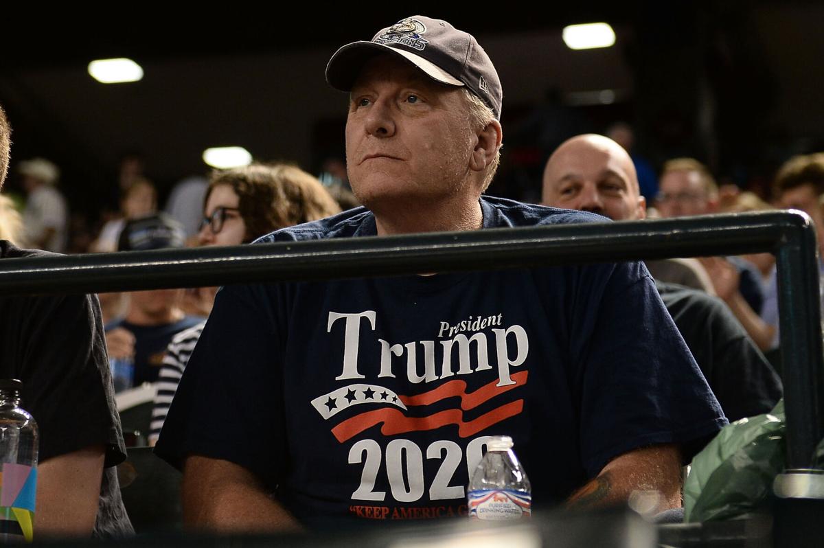 Curt Schilling watches a 2018 game between the San Francisco Giants and Arizona Diamondbacks at Chase Field in Phoenix.