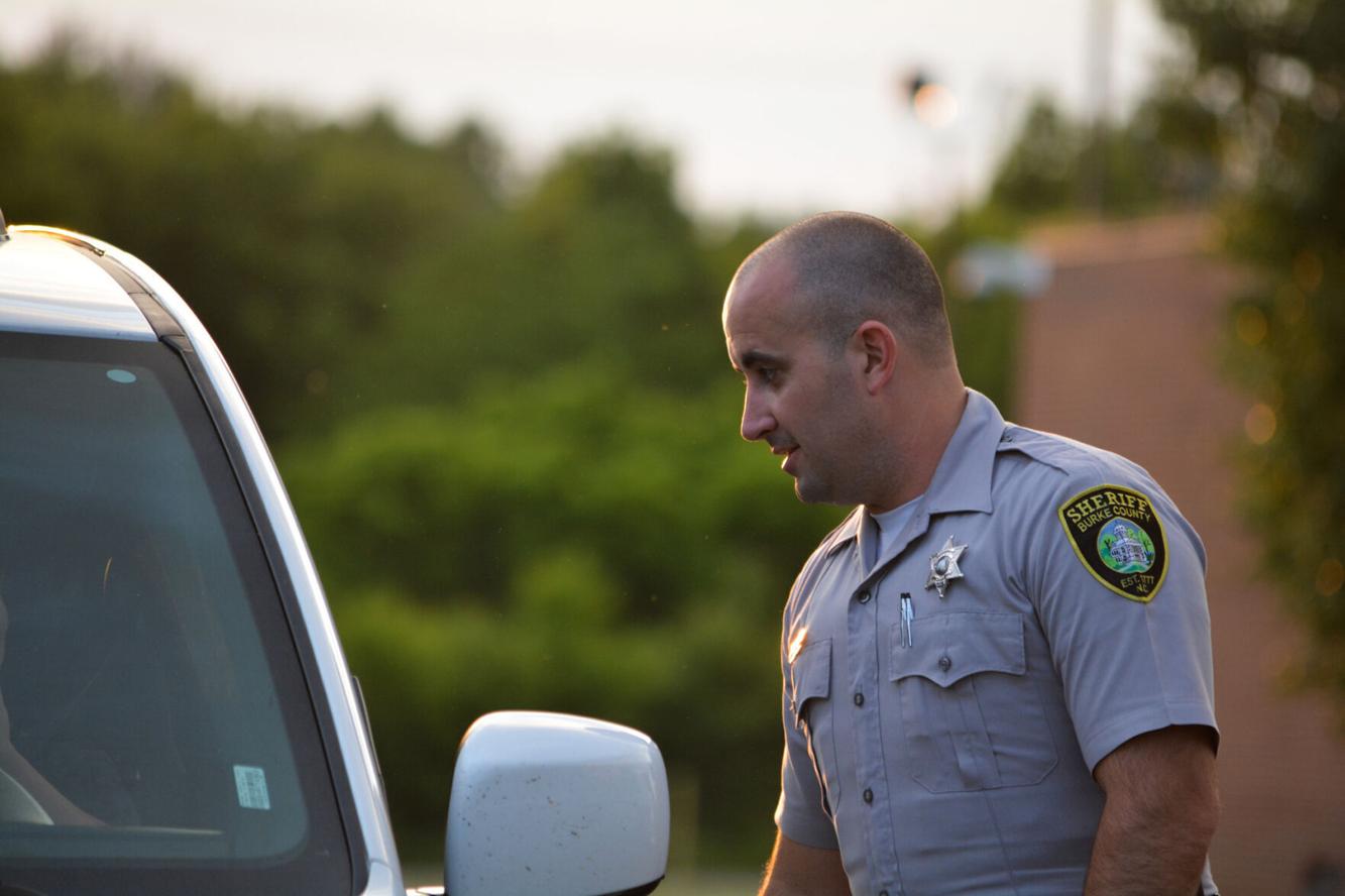 Locks malfunction at NC jail. Burke County officers smelled smoke but