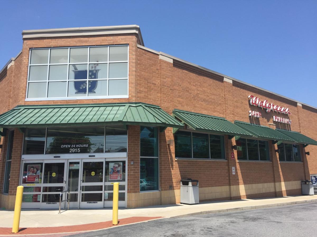 Walgreens robbed at gunpoint, police searching for 2 suspects | Latest